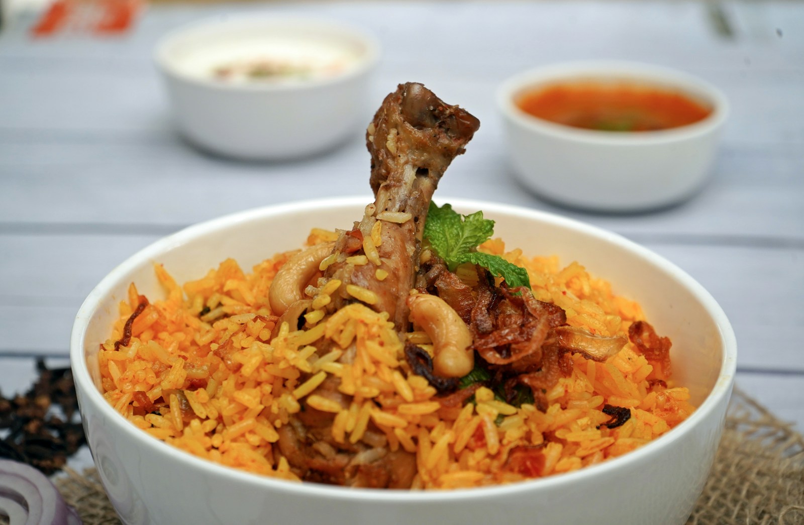 Fresh biryani served with vapour at Biryani Mahal